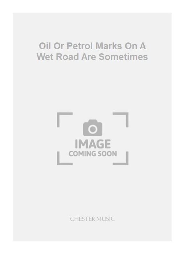 Oil And Petrol Marks On A Wet Road Are Sometimes